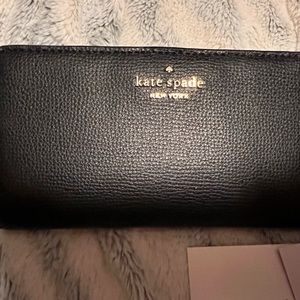 Kate Spade black wallet gray on the inside new with tags